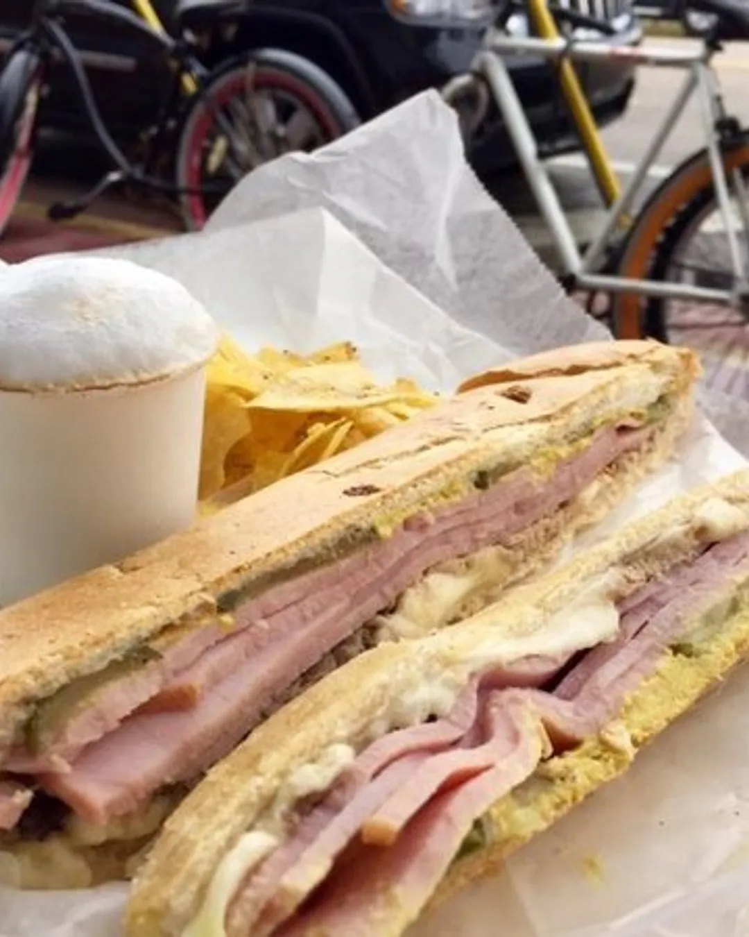 Las Olas Cafe signature dishes Cubano SandwichMedianoche SandwichCubano Bowl